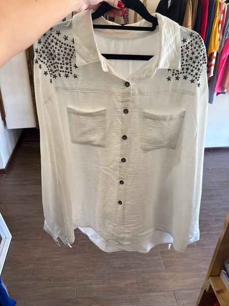 Blusas tachas y estrellas